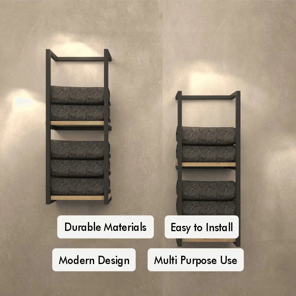 minimalistic black metal wall-mounted shelves with a light wood base, neatly holding dark gray towels against a beige wall