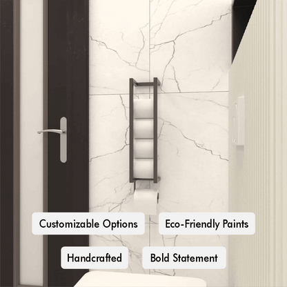 A close-up of a black wall-mounted vertical toilet paper holder in a modern bathroom, showcasing multiple rolls stacked vertically with the in-use roll at the bottom slot.
