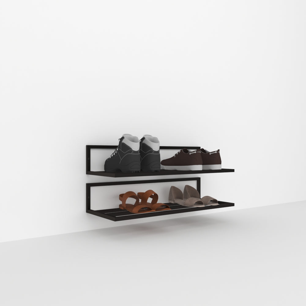 A sleek black wall-mounted Modern Design Metal Shoe Rack with two tiers, displaying various footwear including boots, sneakers, and heels, set against a white background for a minimalist look.